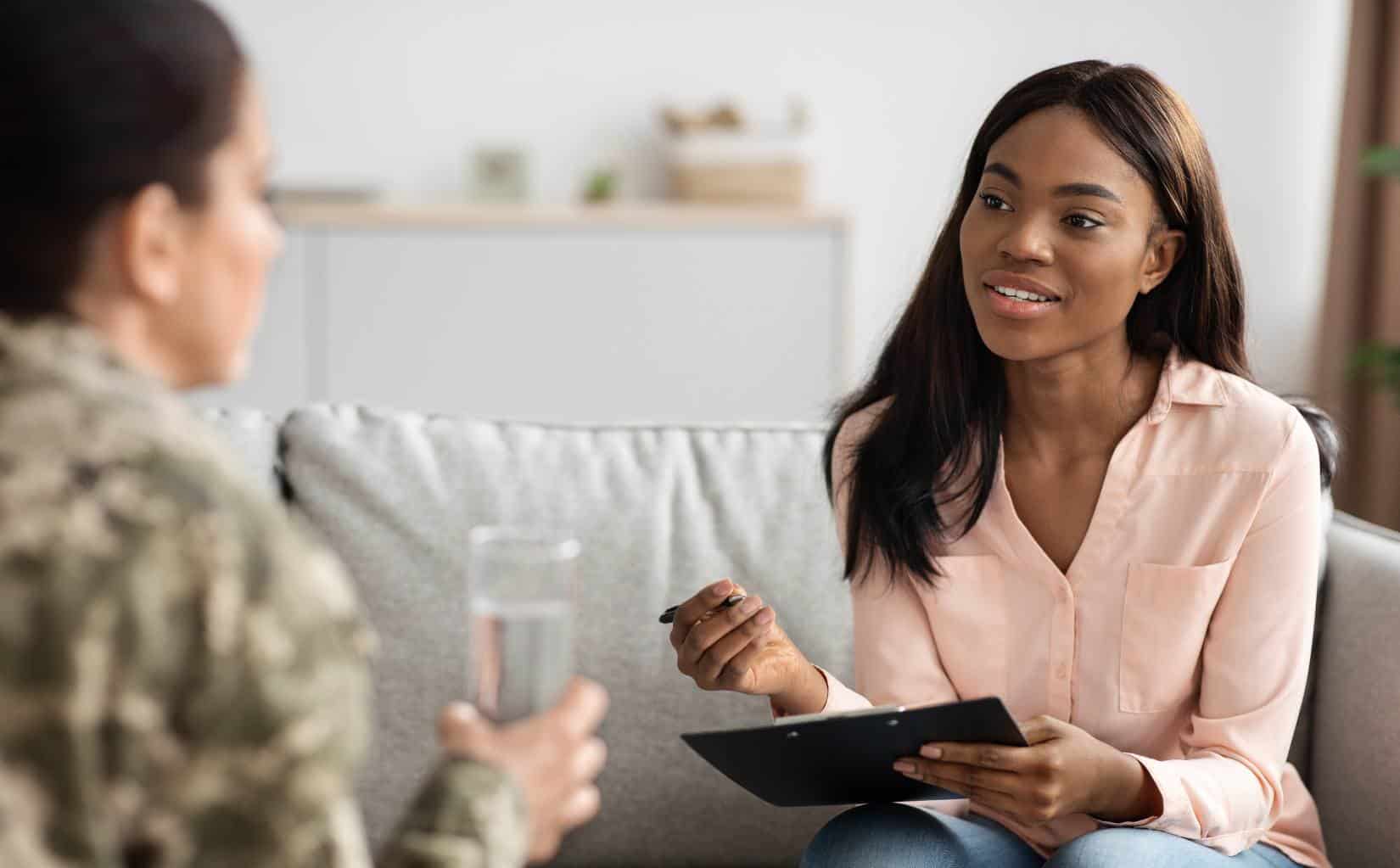 Therapist providing one-on-one support at a veterans rehab in South Jersey.